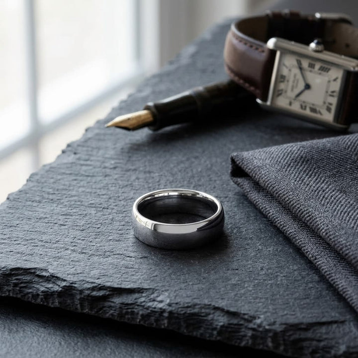 7mm Slightly Domed Super Light Comfort-Fit Wedding Band in 14K White Gold, on walnut surface with pocket square