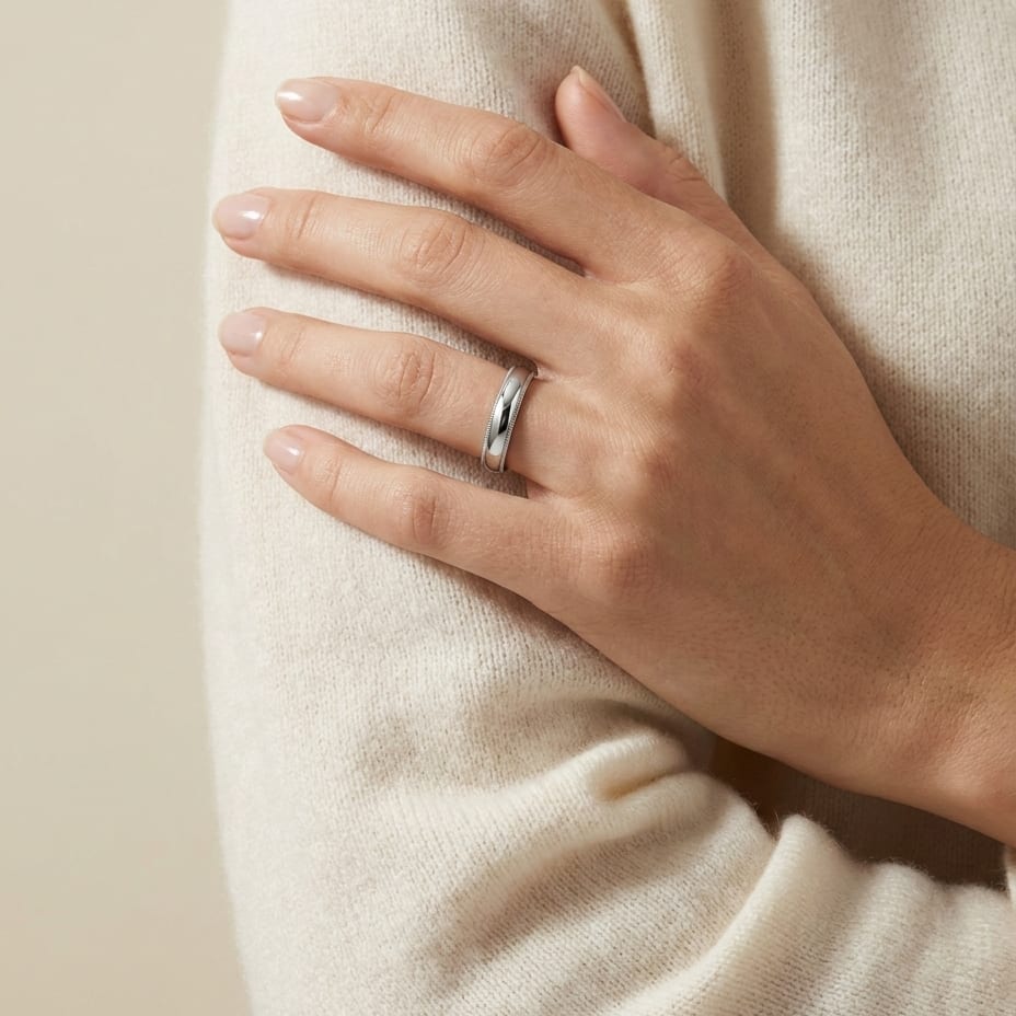 4mm Slightly Domed Super Light Milgrain Comfort-Fit Wedding Band in 14K White Gold, worn on hand, full view