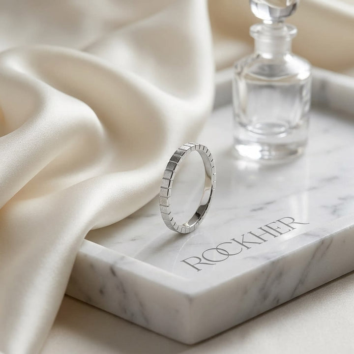 2mm High Polish Carved Wedding Band in 14K White Gold, on marble vanity tray with silk