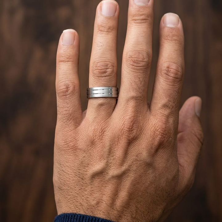 6mm Satin Finish Parallel Center Cut Carved Wedding Band in 14K White Gold, worn on hand, masculine close-up