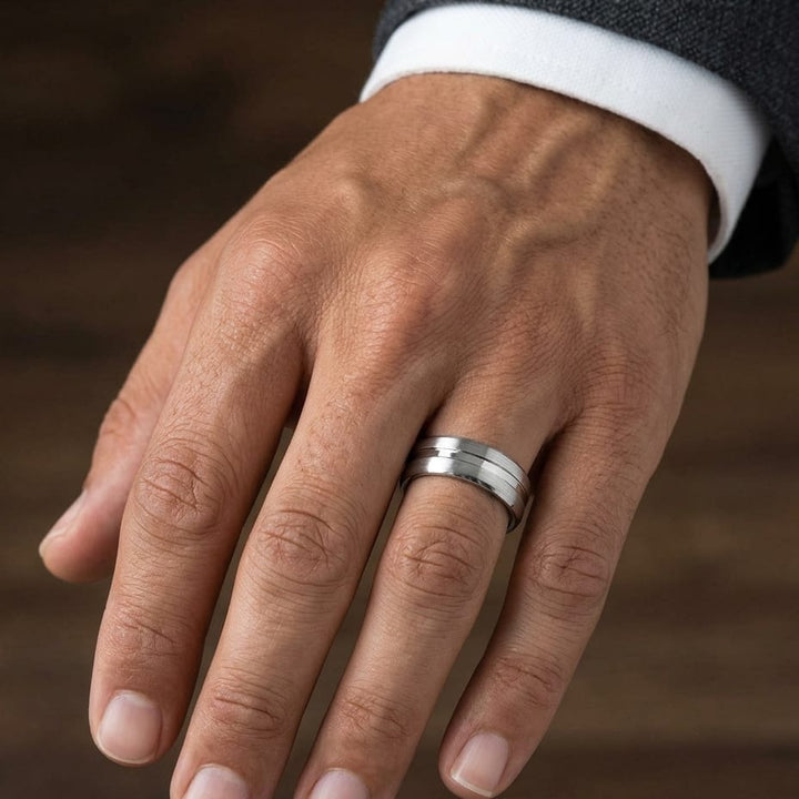 7.5mm Satin Finish High Polished Center Cut Carved Wedding Band in 14K White Gold, worn on hand, masculine close-up