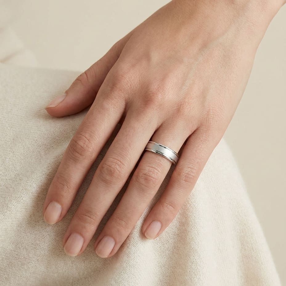 4mm Wired Finish High Polished Round Edge Carved Wedding Band in 14K White Gold, worn on hand, full view