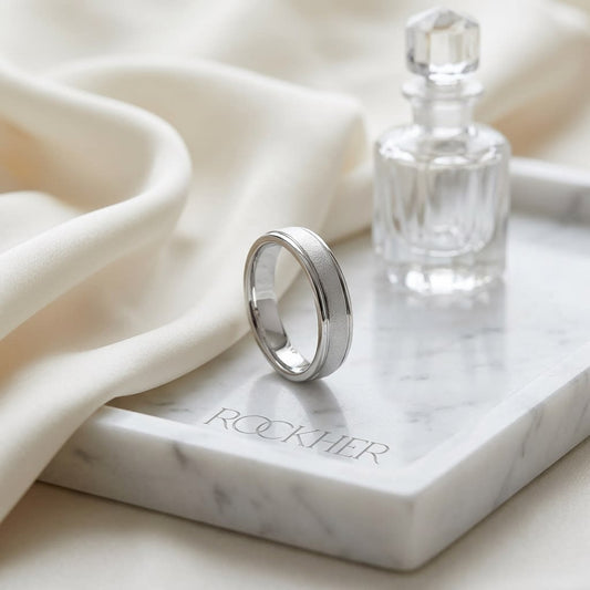 4mm Wired Finish High Polished Round Edge Carved Wedding Band in 14K White Gold, on marble vanity tray with silk