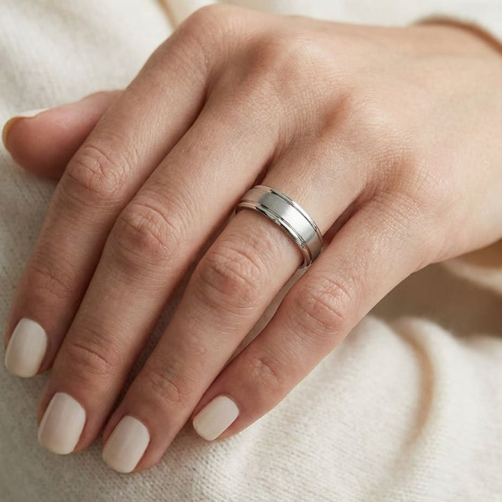 4mm Satin Finish High Polished Round Edge Carved Wedding Band in 14K White Gold, worn on hand, close-up