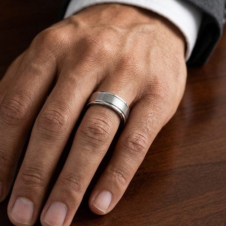 7mm Satin Finish Carved Wedding Band in 14K White Gold, worn on hand, masculine close-up