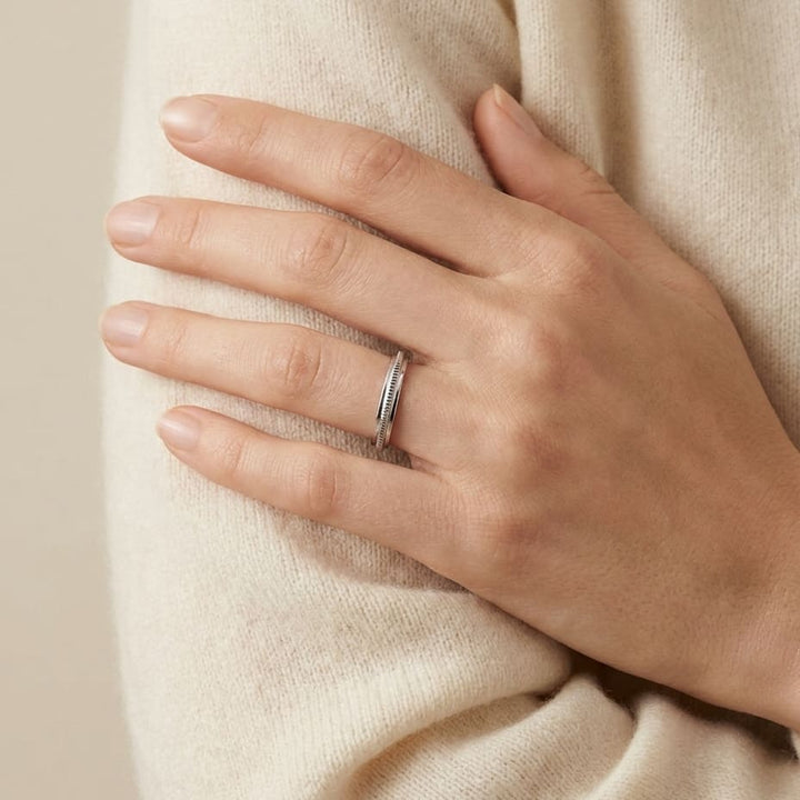2mm High Polish Milgrain Round Edge Carved Wedding Band in 14K White Gold, worn on hand, full view