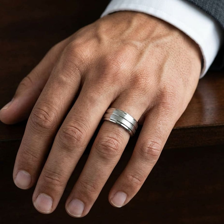 8mm Satin Finish High Polished Center Cut Carved Wedding Band in 14K White Gold, worn on hand, masculine close-up