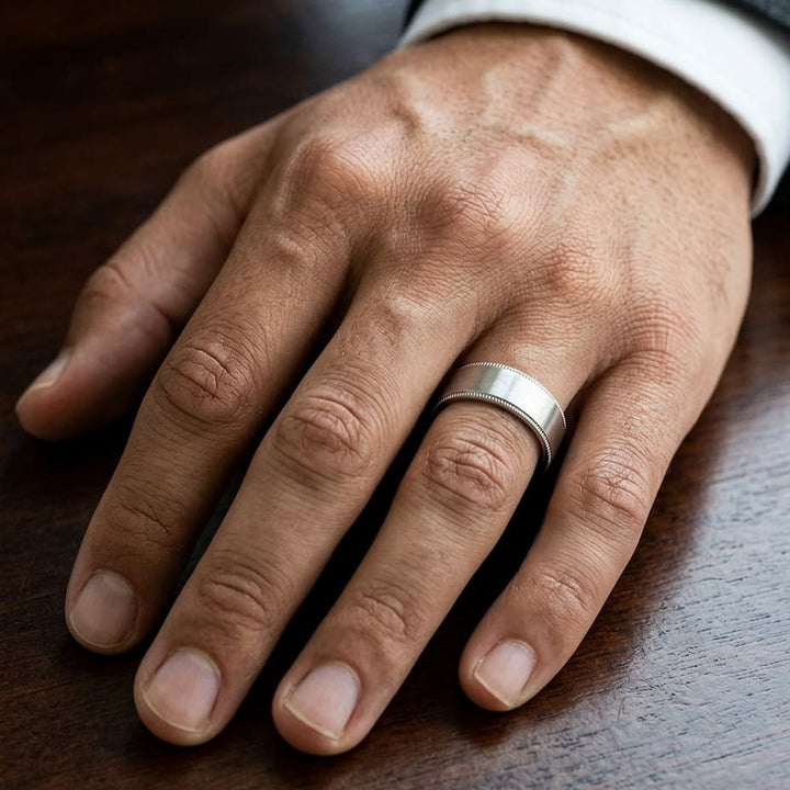 8mm Satin Finish Carved Wedding Band in 14K White Gold, worn on hand, masculine close-up