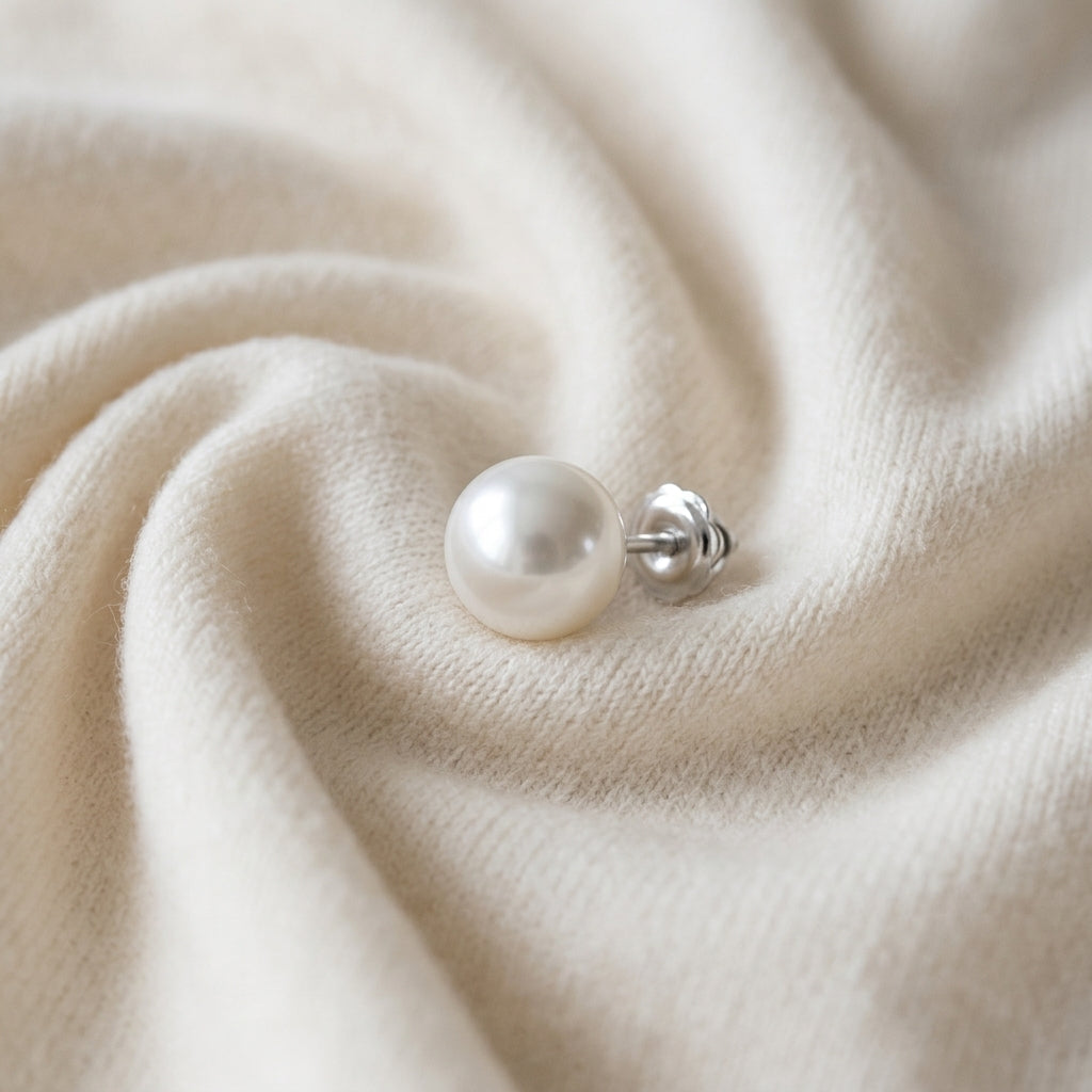 White 6-6.5mm Akoya Pearl Stud Earrings in 14K White Gold - flat lay