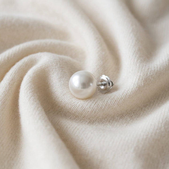 White 6-6.5mm Akoya Pearl Stud Earrings in 14K White Gold - flat lay