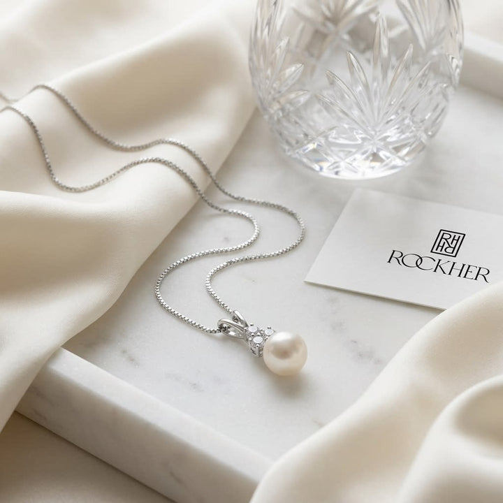 Cultured Pearl Pear Shape Pendant in 14K White Gold, on marble vanity tray with silk