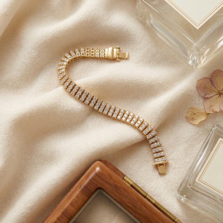 Diamond Round 4-Prong Triple Row Bracelet in 14K Yellow Gold - flat lay