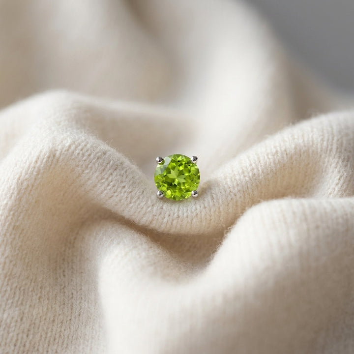 Peridot Round 4-Prong Stud Earrings with Screwbacks 6mm in 14K Yellow Gold - flat lay