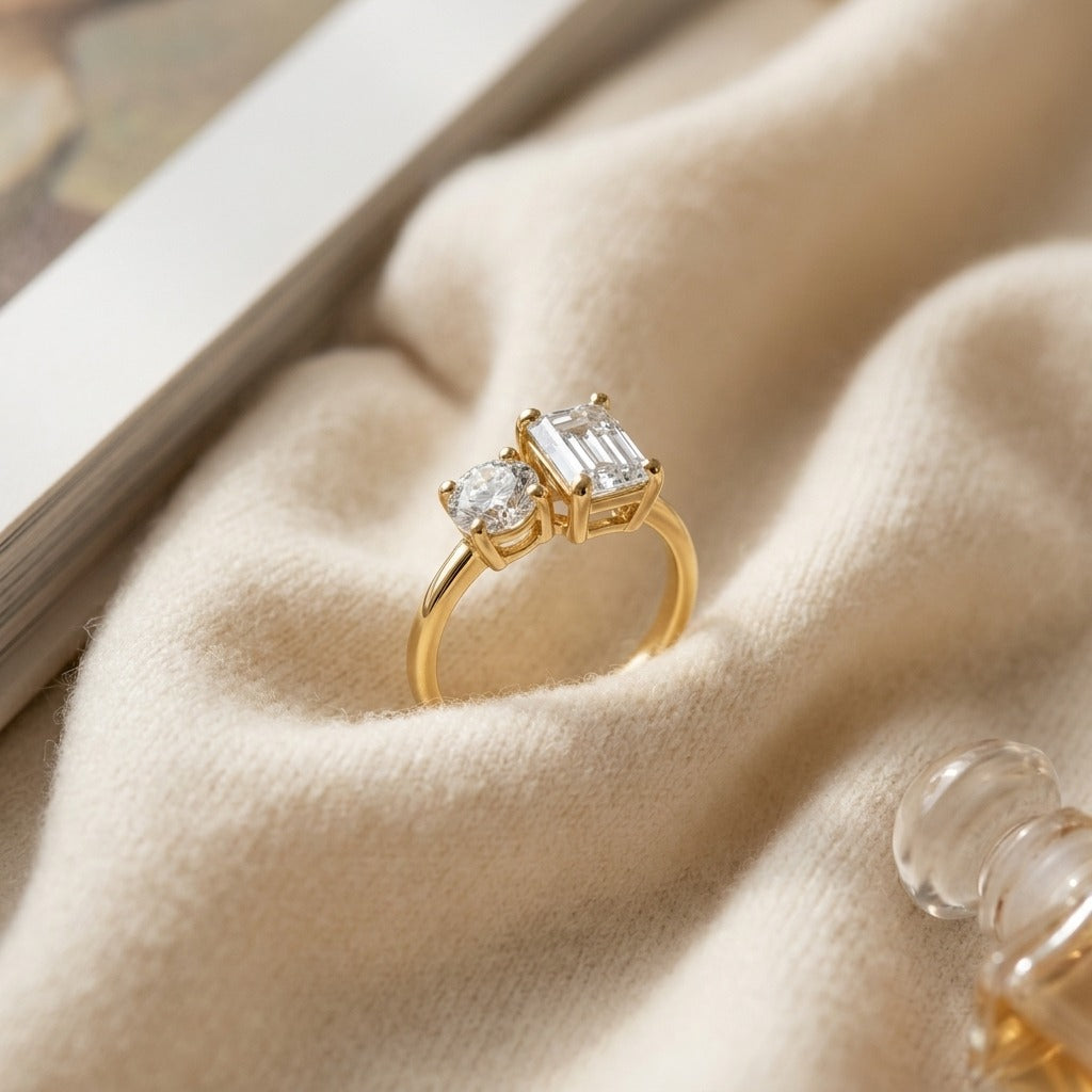 Round & Emerald Cut Diamond Ring in 14K Yellow Gold - flat lay