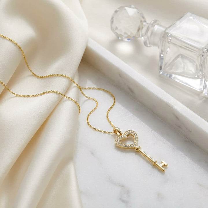 Natural Diamond Heart Shape Pendant in 14K Yellow Gold, 6 ct. t.w., on marble vanity tray with silk