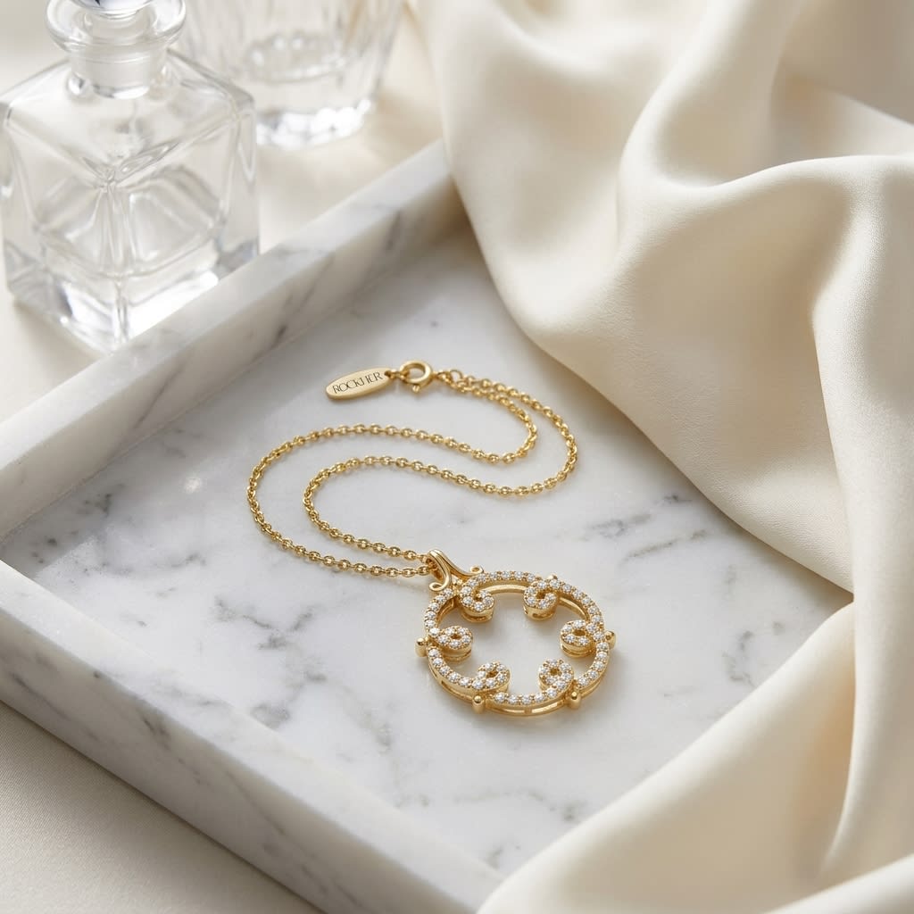 Natural Diamond Round Brilliant Pendant in 14K Yellow Gold, on marble vanity tray with silk