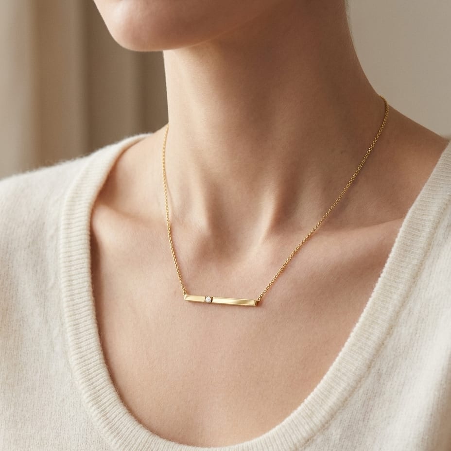 Diamond Bar Necklace in 14K Yellow Gold, worn close-up portrait