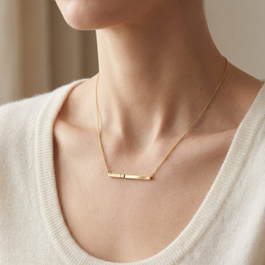 Diamond Bar Necklace in 14K Yellow Gold, worn close-up portrait