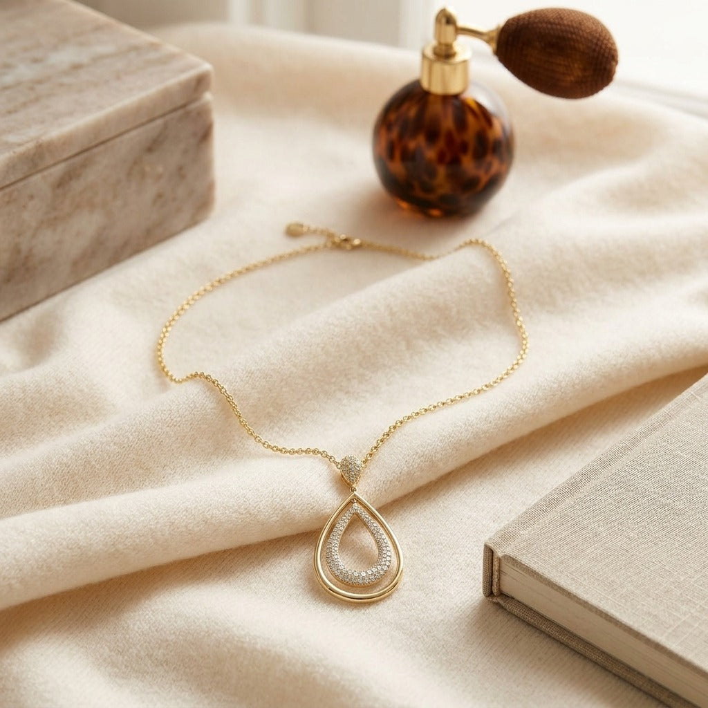 Diamond Double Oval Pendant 18 Inch Length in 14K Yellow Gold - flat lay