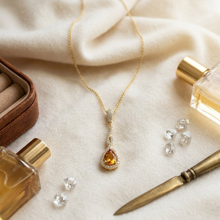 Citrine & Diamond Pendant in 14K Yellow Gold - flat lay