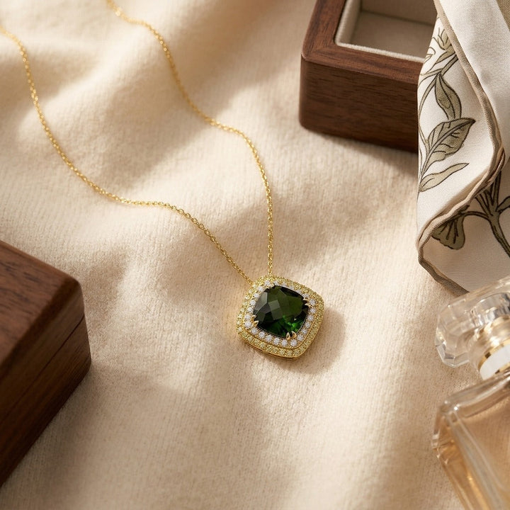 Green Tourmaline Cushion Pendant with Peridot & Diamond Borders in 14K Yellow Gold - flat lay