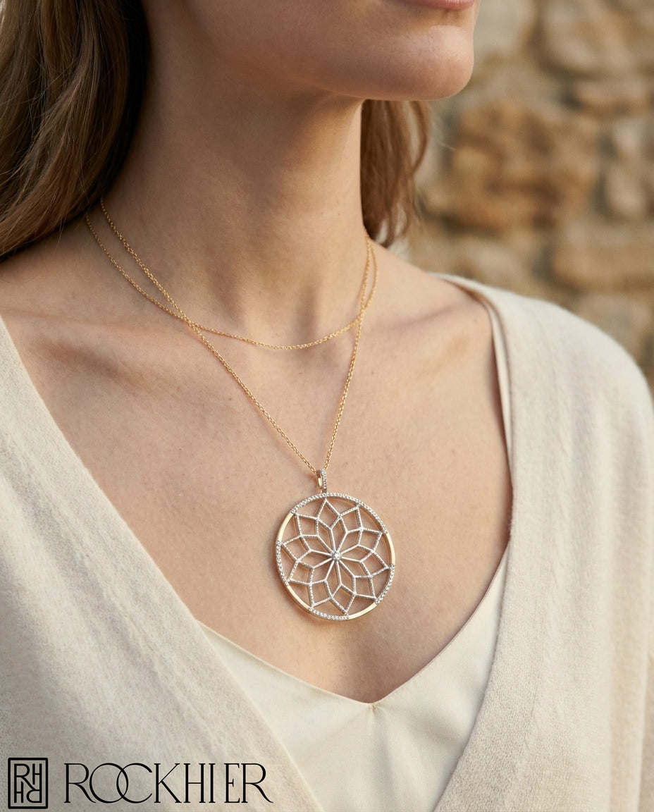 Diamond Snowflake Pendant With Circular Frame in 14k Yellow Gold 0.30ctw, 16-18 Inch Adjustable Rolo Chain, worn close-up portrait