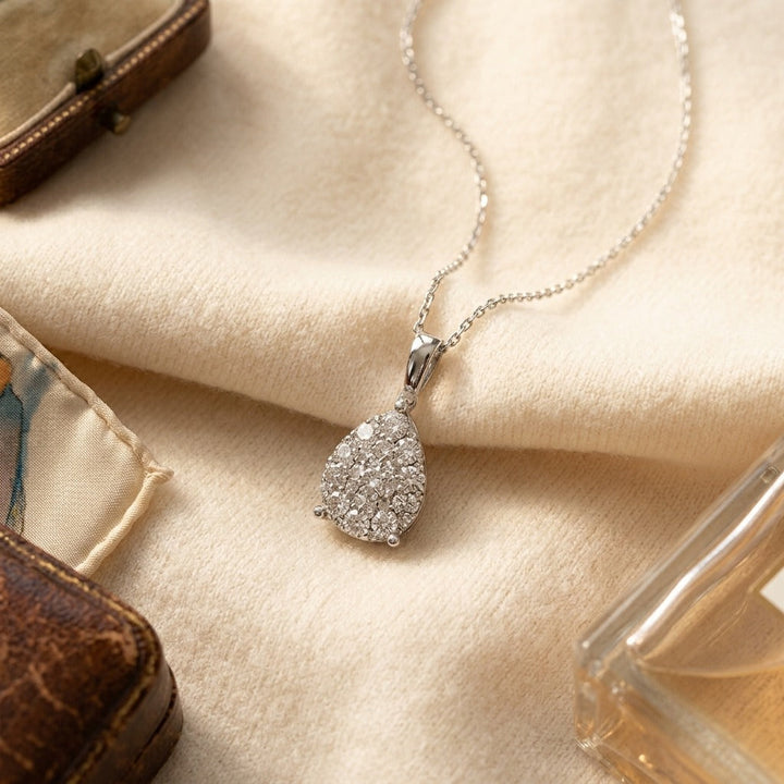 Diamond Pear Shape Cluster Solitaire Pendant 3/8ctw with Adjustable Chain 16-17-18 Inch in 14K Yellow Gold - flat lay