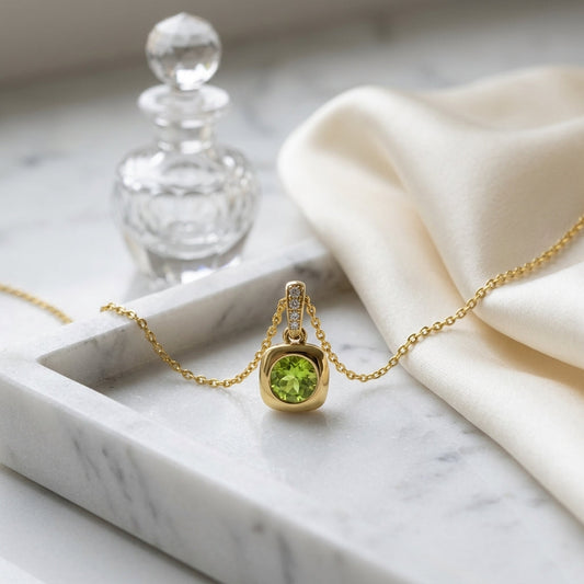 Peridot Round Bezel & Diamond 0.02ctw Pendant Set 16-18 Adj Chain in 14K Yellow Gold - editorial
