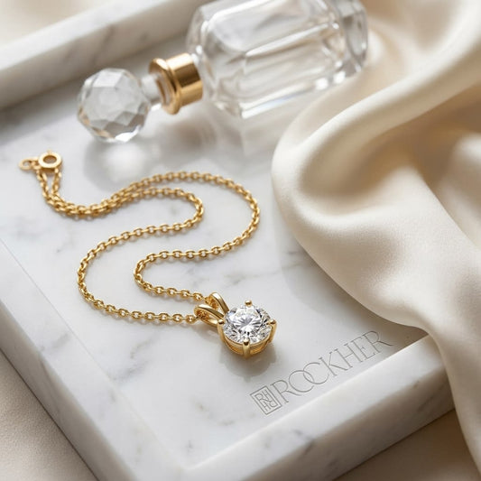 Natural Diamond Round Brilliant Solitaire Pendant in 14K Yellow Gold, 8 ct. t.w., on marble vanity tray with silk