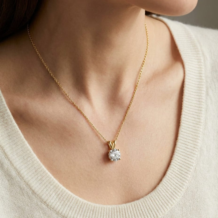 Natural Diamond Round Brilliant Solitaire Pendant in 14K Yellow Gold, 2 ct. t.w., worn close-up portrait