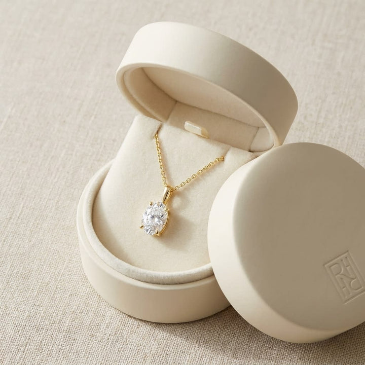 Natural Diamond Oval Solitaire Pendant in 14K Yellow Gold, 4 ct. t.w., in navy velvet jewelry box