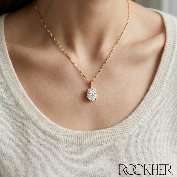 Natural Diamond Oval Solitaire Pendant in 14K Yellow Gold, 4 ct. t.w., worn close-up portrait