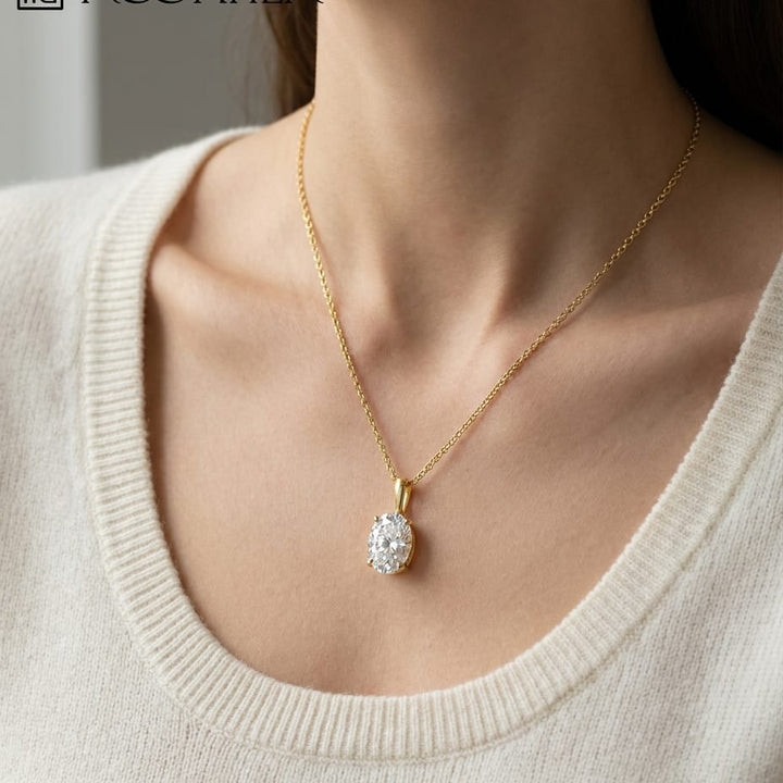 Natural Diamond Oval Solitaire Pendant in 14K Yellow Gold, 2 ct. t.w., worn close-up portrait