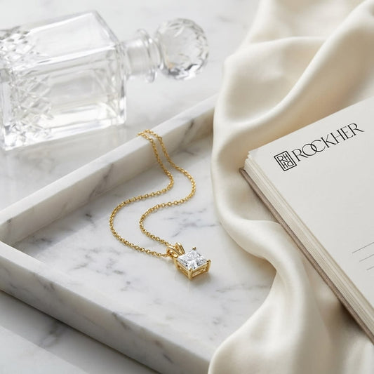 Natural Diamond Princess Cut Solitaire Pendant in 14K Yellow Gold, 4 ct. t.w., on marble vanity tray with silk