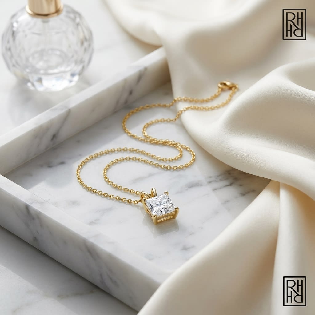 Natural Diamond Princess Cut Solitaire Pendant in 14K Yellow Gold, 3 ct. t.w., on marble vanity tray with silk