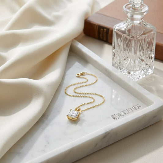 Natural Diamond Princess Cut Solitaire Pendant in 14K Yellow Gold, 4 ct. t.w., on marble vanity tray with silk