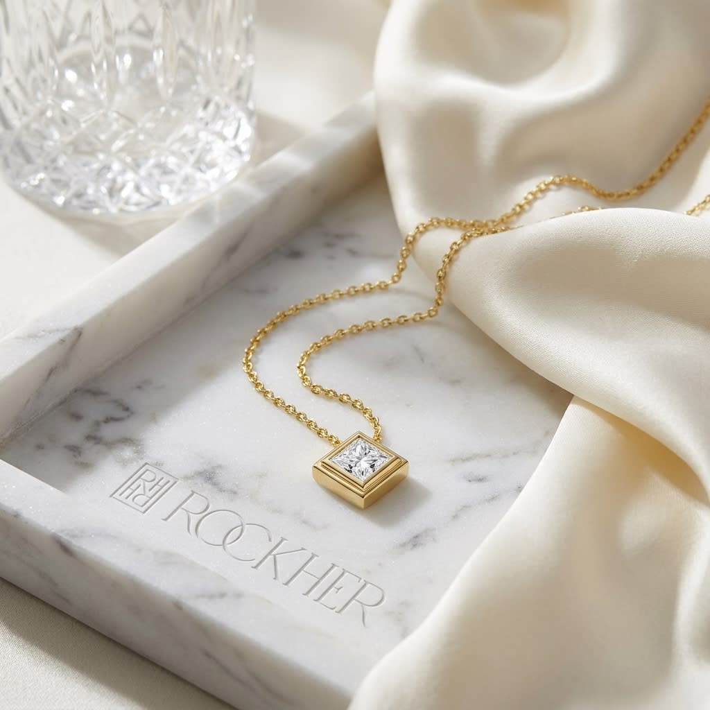 Natural Diamond Princess Cut Solitaire Pendant in 14K Yellow Gold, 8 ct. t.w., on marble vanity tray with silk