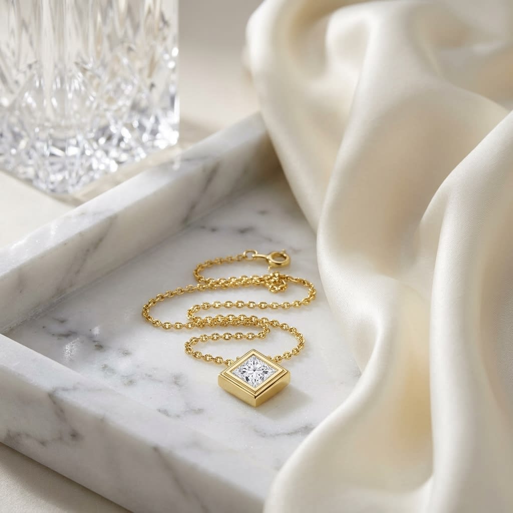 Natural Diamond Princess Cut Solitaire Pendant in 14K Yellow Gold, 4 ct. t.w., on marble vanity tray with silk