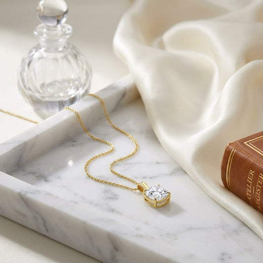 Natural Diamond Cushion Solitaire Pendant in 14K Yellow Gold, 3 ct. t.w., on marble vanity tray with silk