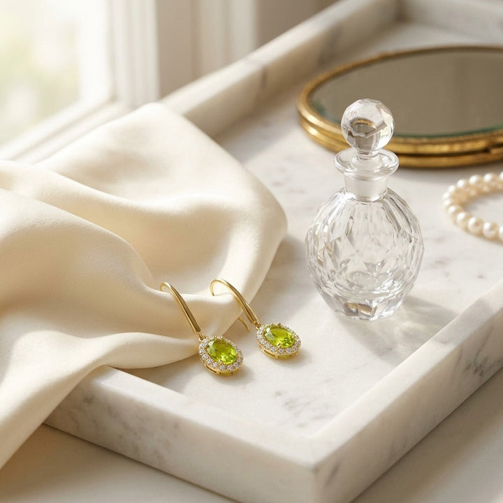 Peridot & Diamond Oval Halo Leverback Earrings 1/4ctw in 14K Yellow Gold - lifestyle