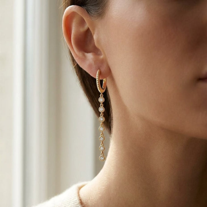 Diamond Milgrained Dangle Earring With Huggie Top in 14K Yellow Gold, worn close-up portrait