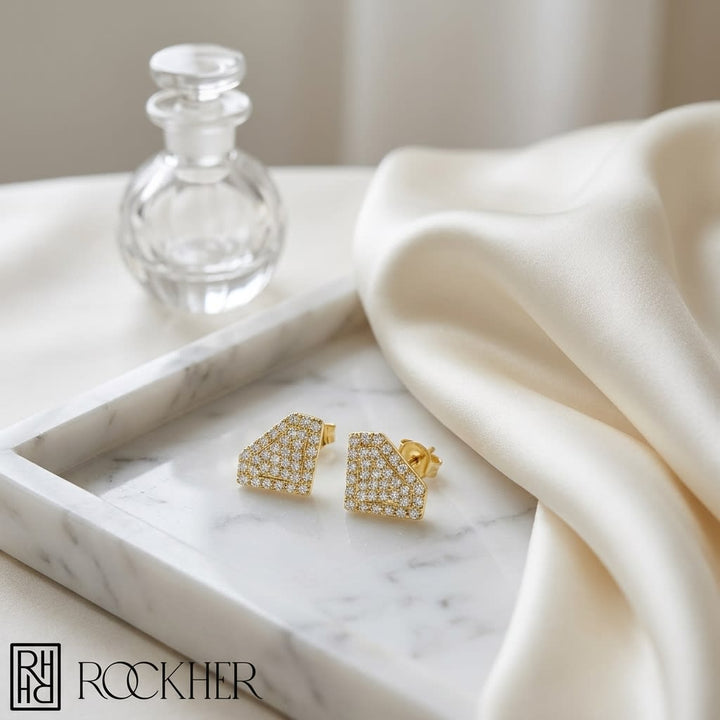 Natural Diamond Round Brilliant Stud Earrings in 14K Yellow Gold, 2 ct. t.w., on marble vanity tray with silk