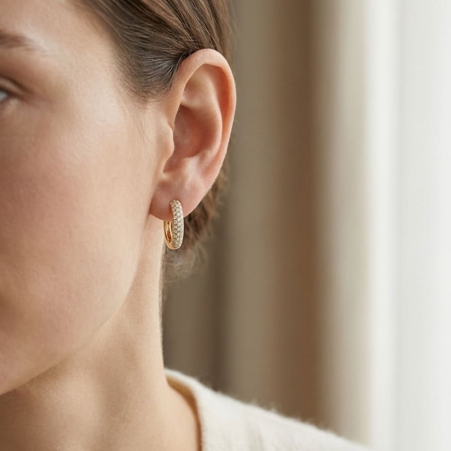 Micro Pave Diamond Huggie Earrings in 14K Yellow Gold 0.30ctw, worn close-up portrait