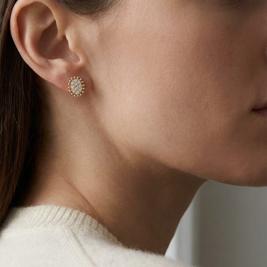 Natural Diamond Oval Stud Earrings in 14K Yellow Gold, worn close-up portrait