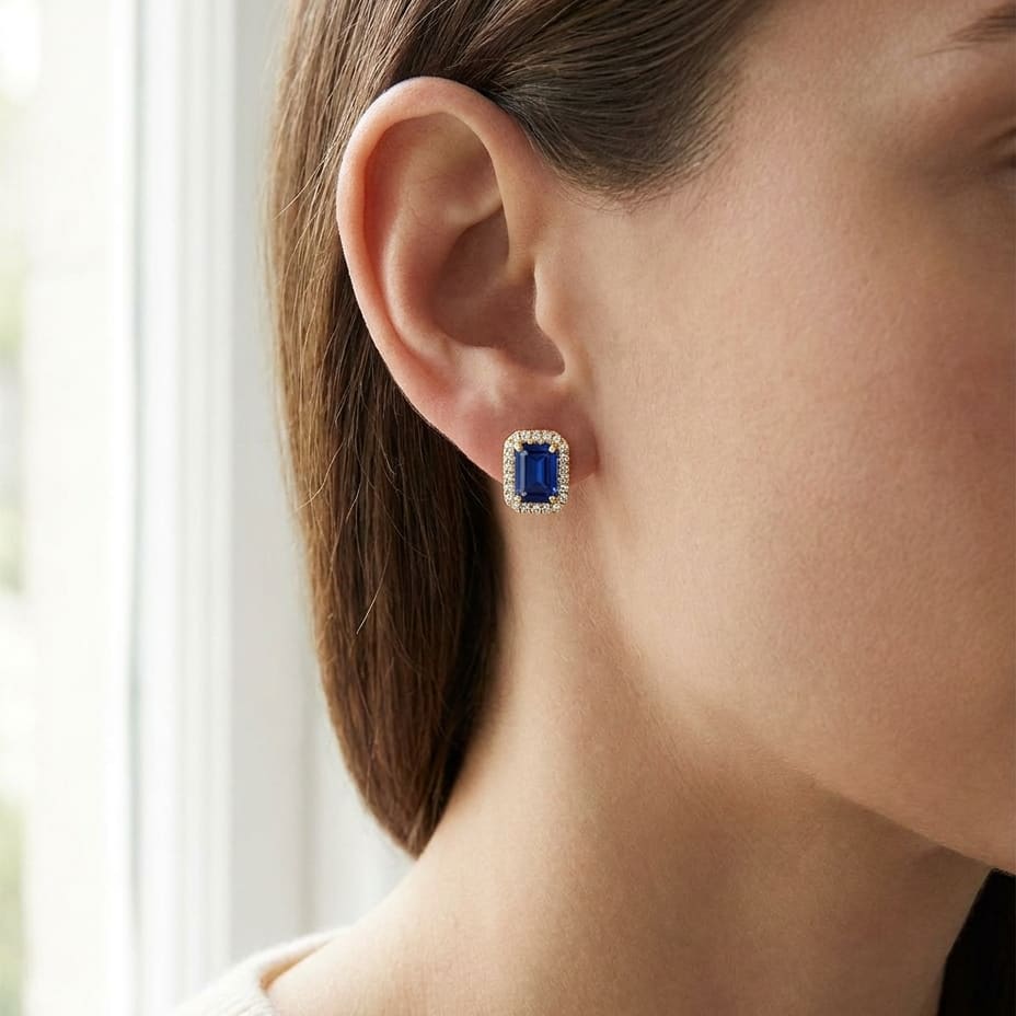 Sapphire Octagon Stud Earrings in 14K Yellow Gold, worn close-up portrait
