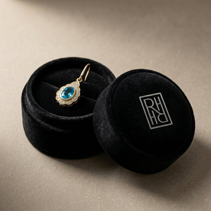 Blue Topaz & Diamond Oval Bezel Leverback Earrings with Teardrop Scallop Frame 1/2ctw in 14K Yellow Gold - presentation