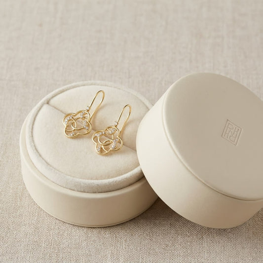 Diamond Open Clover Dangle Earrings With Twine Design And French Wire Backs in 14K Yellow Gold, in navy velvet jewelry box