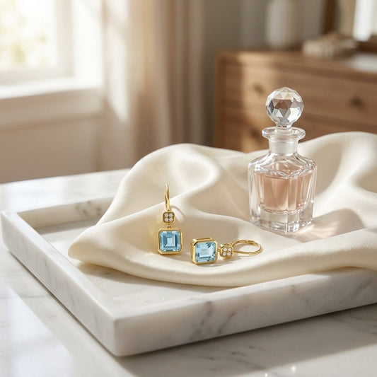 Swiss Blue Topaz Bezel Earrings 0.08ctw in 14K Yellow Gold - editorial