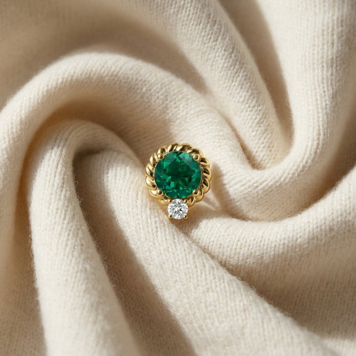 Lab Created Emerald & Diamond Ripple Edge Halo Stud Earrings 1/5ctw in 14K Yellow Gold - flat lay