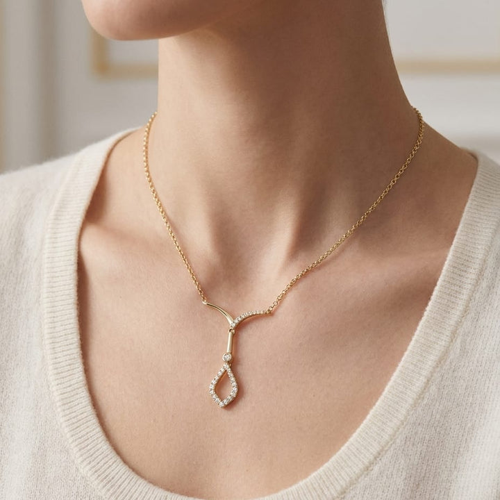 Open Kite Diamond Drop Necklace in 14K Yellow Gold, worn close-up portrait